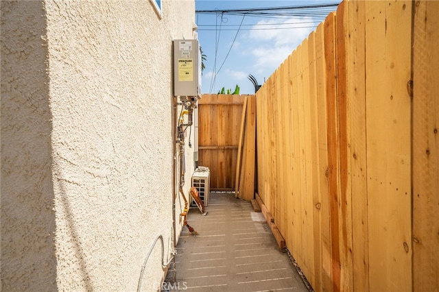 916 W 88th St, Los Angeles, CA 90044 - view of side of home with fence and stucco siding