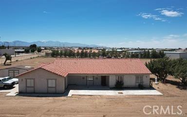 view of front of property with a mountain view