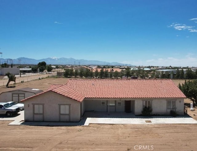 exterior space featuring a mountain view