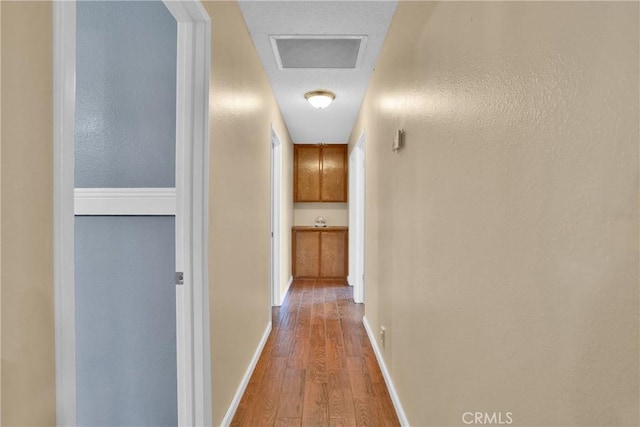 corridor featuring light hardwood / wood-style flooring