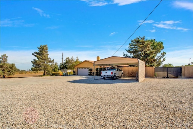 single story home featuring a carport