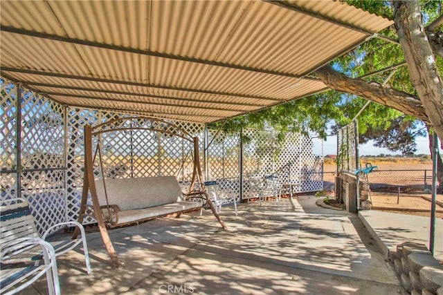 view of patio featuring a pergola