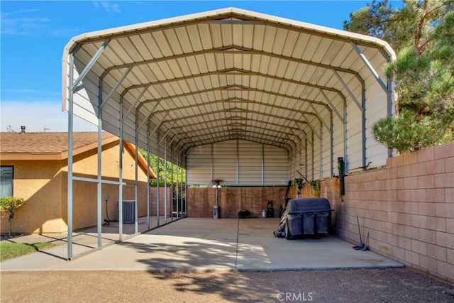 exterior space with a carport