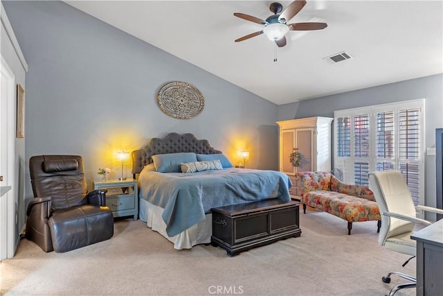 bedroom with carpet flooring, ceiling fan, and lofted ceiling