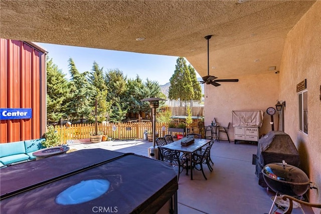 view of patio / terrace featuring ceiling fan