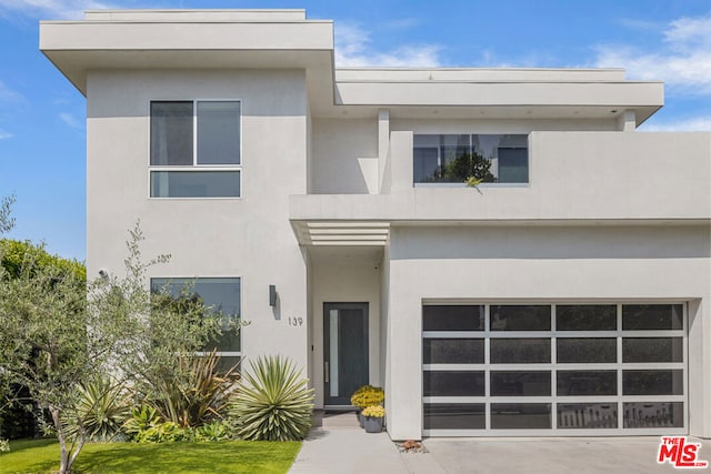 contemporary house featuring a garage