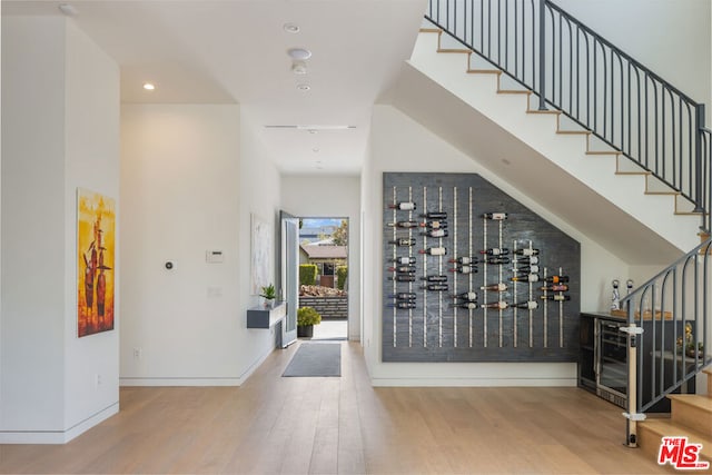 wine cellar featuring hardwood / wood-style floors