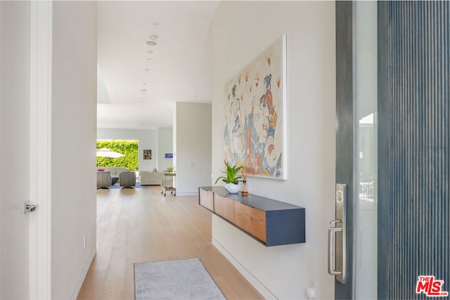 hallway featuring light hardwood / wood-style floors