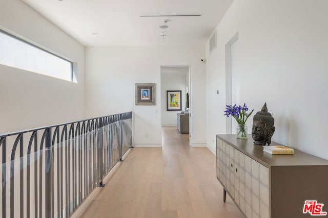 hallway featuring light hardwood / wood-style flooring