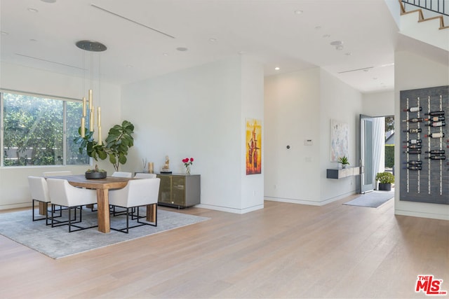 dining area with light wood-type flooring