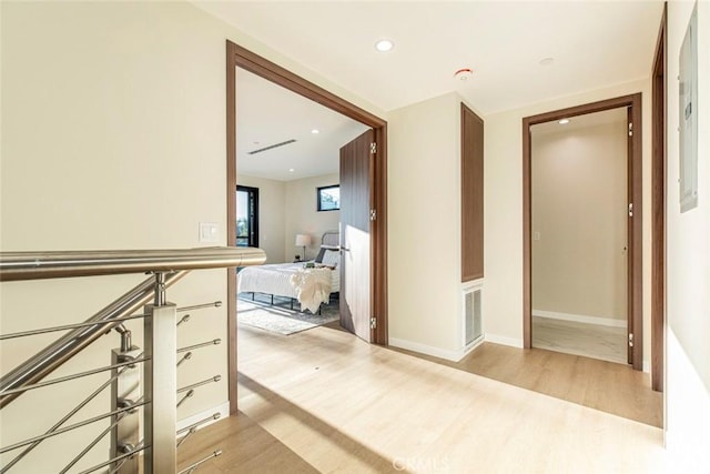 hallway with light wood-type flooring