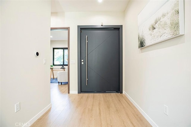 hallway featuring light hardwood / wood-style flooring