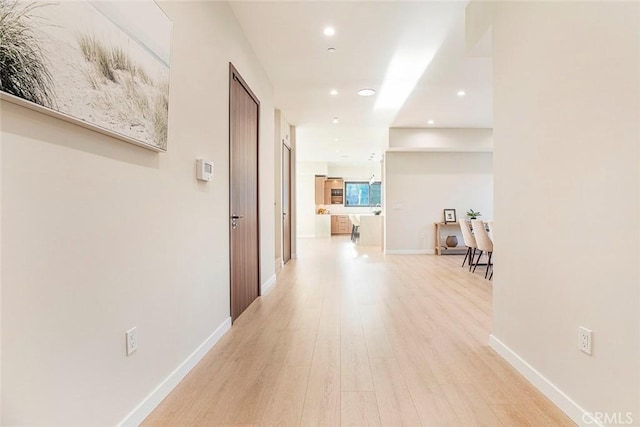 hall featuring light wood-type flooring