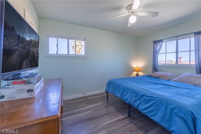 bedroom featuring ceiling fan and wood-type flooring