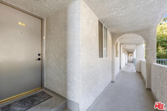 doorway to property with a balcony