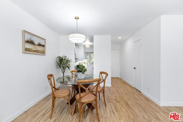 dining room featuring light hardwood / wood-style flooring