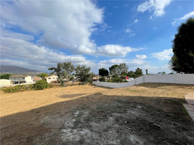 view of yard with a mountain view