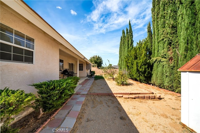 view of yard with a patio area