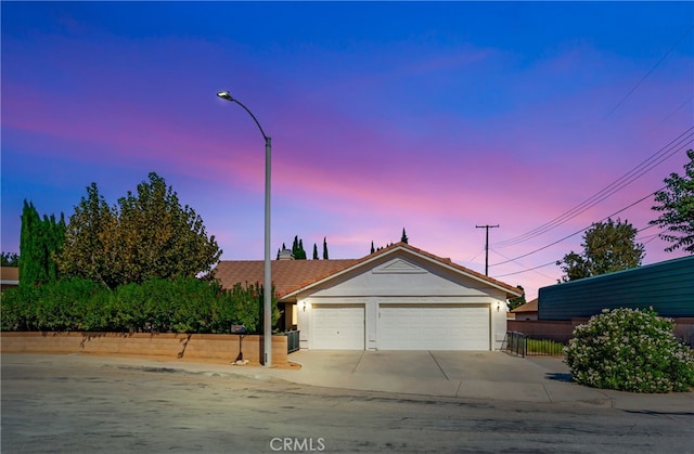 view of front of house with a garage