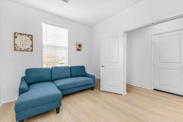 sitting room featuring light wood-type flooring