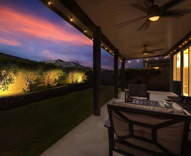 view of patio featuring ceiling fan