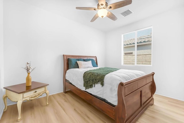 bedroom featuring ceiling fan and light wood-type flooring