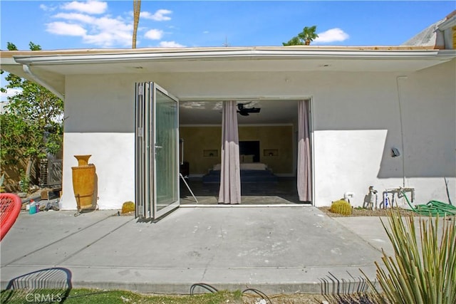 property entrance with a patio