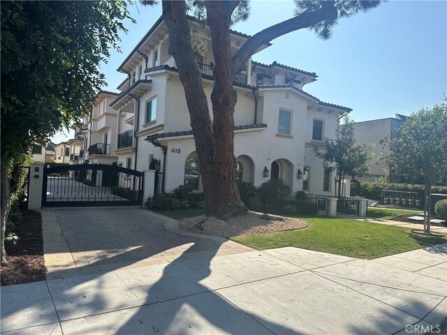 418UNITD W Fairview Ave Unit D, Arcadia, CA 91007 - view of front facade featuring a gate, driveway, and stucco siding