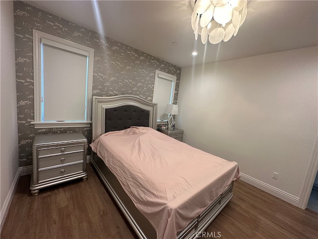 bedroom featuring dark hardwood / wood-style floors