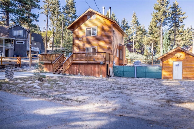 exterior space featuring a wooden deck