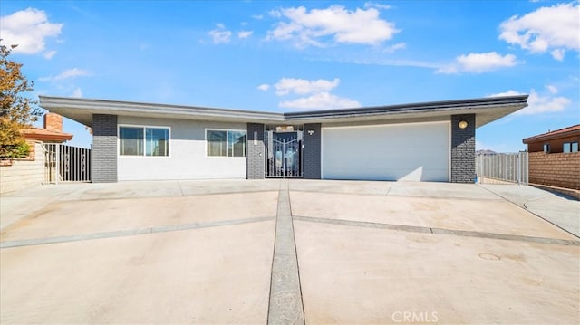 single story home featuring a garage