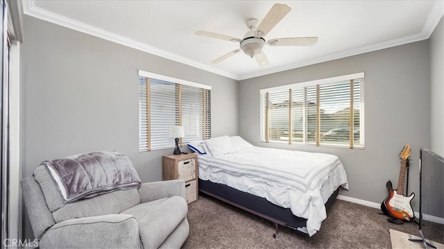 bedroom with ceiling fan, ornamental molding, and carpet