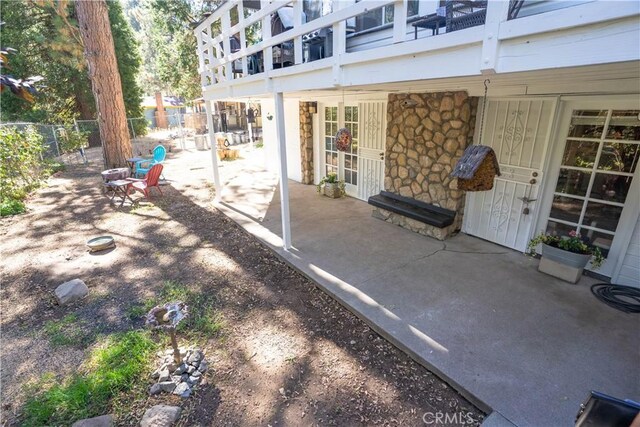 507 Valley Dr, Crestline, CA 92325 - view of patio with french doors and fence