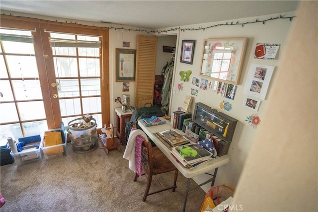 home office with french doors, carpet, and a wealth of natural light