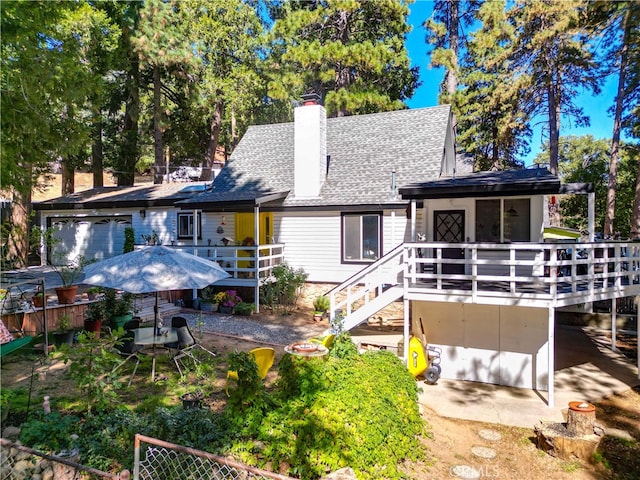 back of property with a patio