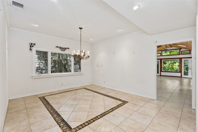 unfurnished dining area with light tile patterned floors, ornamental molding, and a chandelier