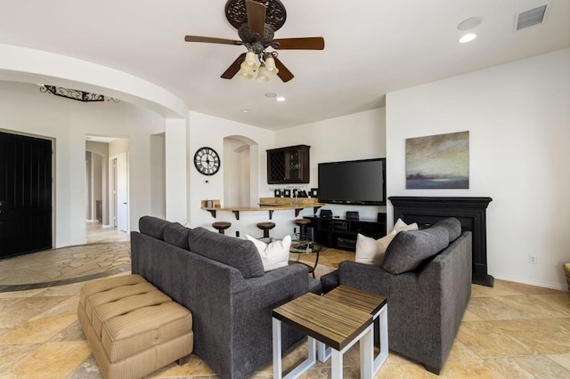 living room featuring ceiling fan