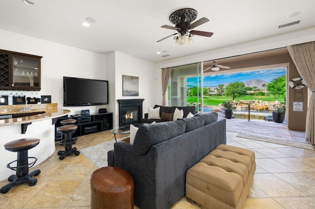 living room with ceiling fan