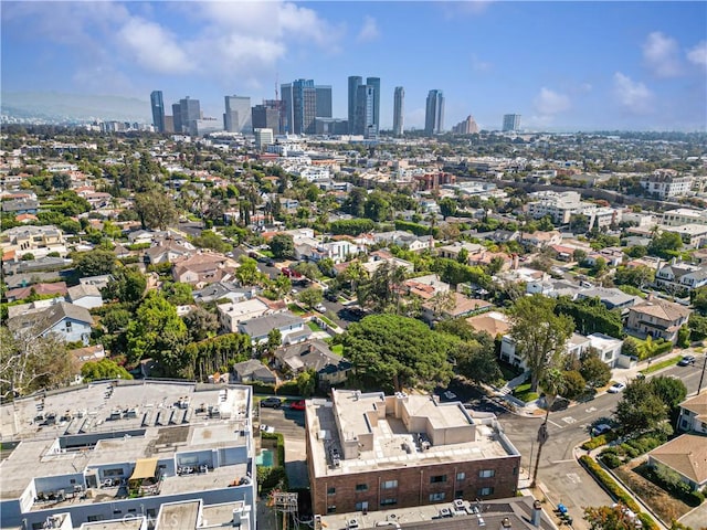 birds eye view of property with a city view