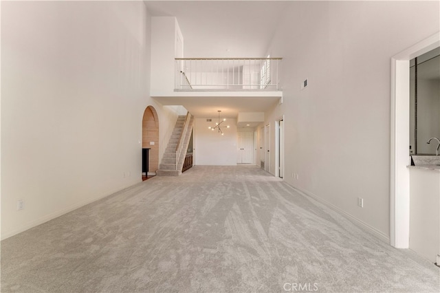 unfurnished living room with carpet