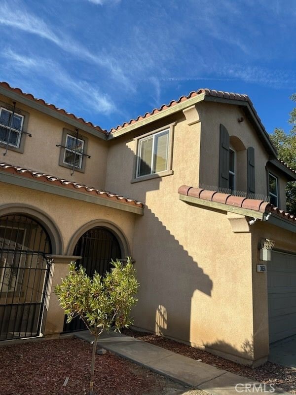 view of property exterior featuring a garage