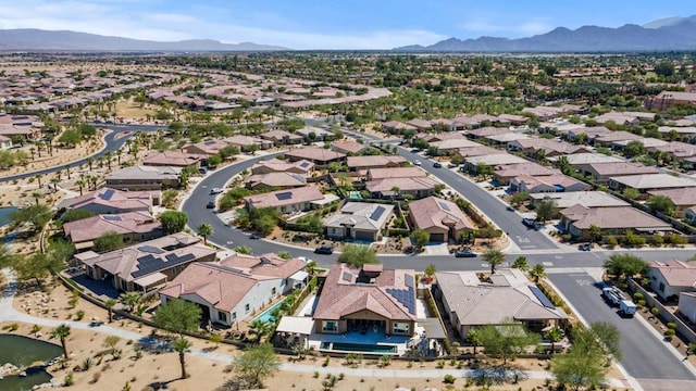 drone / aerial view featuring a mountain view