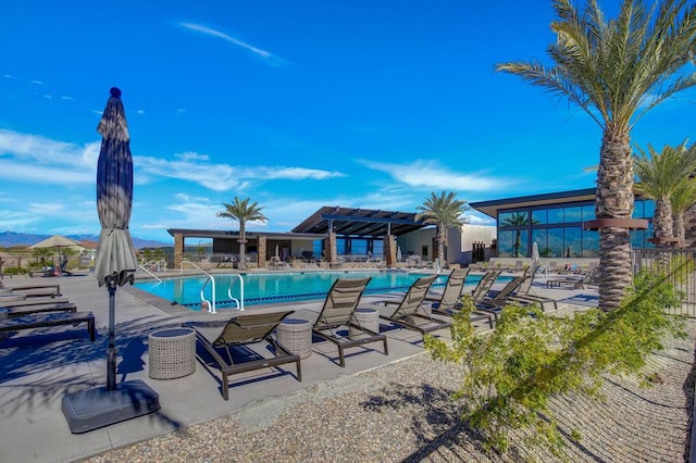 view of swimming pool featuring a patio