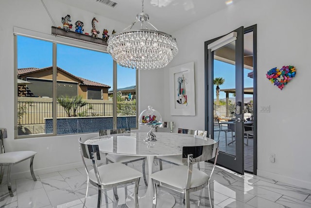 dining room featuring an inviting chandelier