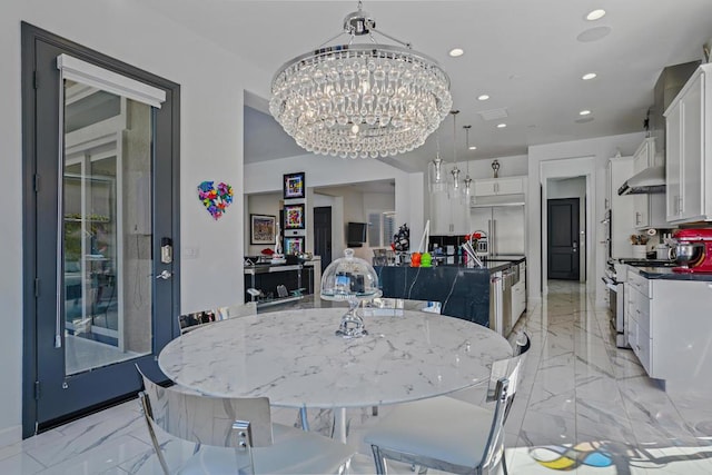 dining area with a notable chandelier