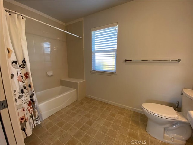 bathroom with shower / bathtub combination with curtain and toilet