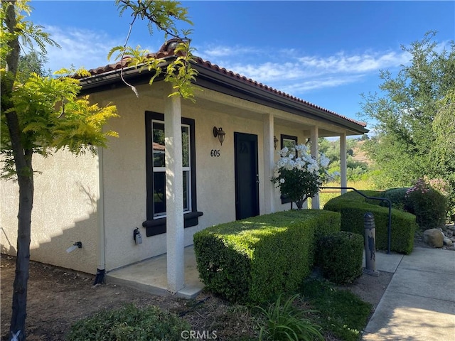 605 N Ferrocarril, Atascadero, CA 93422 - property entrance with stucco siding, covered porch, and a tiled roof