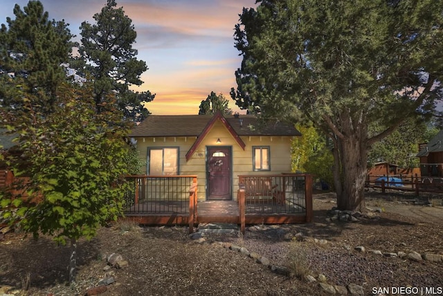 view of front of home featuring a wooden deck