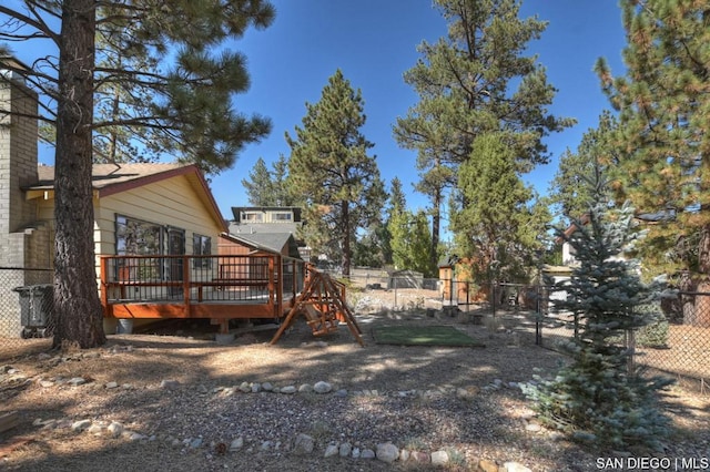 view of yard featuring a deck