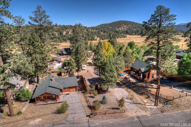 drone / aerial view featuring a mountain view